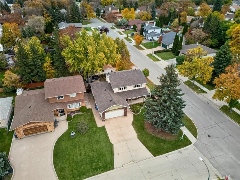 Aerial view of the home and neighbourhood